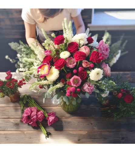 Florist's Choice for Romance Arrangement. An arrangement by Bakman Floral Design.