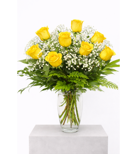 The Classic Dozen Yellow Roses Arranged. An arrangement by The Garden Gate Gifts and Florals.