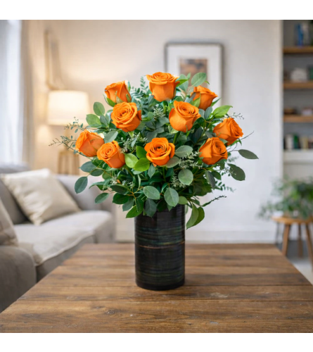 DELUXE ORANGE ROSES - Deluxe. An arrangement by Petals and Co..