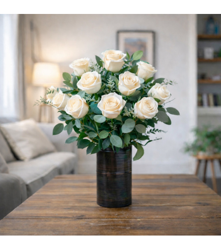 DELUXE WHITE ROSES - Deluxe. An arrangement by Petals and Co..