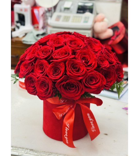 Red Rose Harmony. An arrangement by Flower World and Gifts.