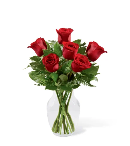 Six Red Roses. An arrangement by Sueppel's Flowers.
