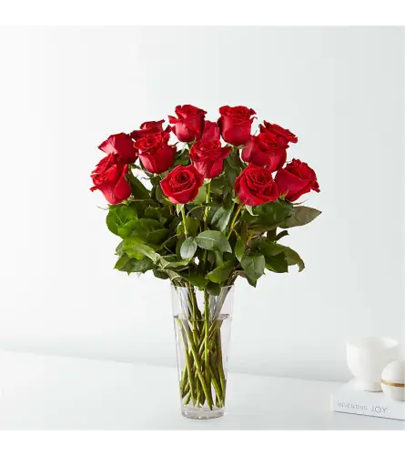 Long Stem Red Roses - Deluxe. An arrangement by Sueppel's Flowers.