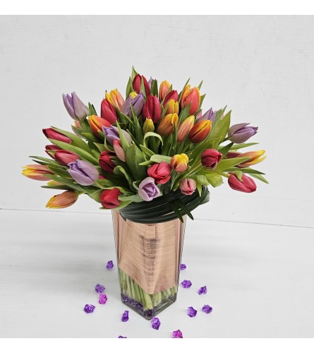 Rush Color Of Tulips. An arrangement by Anthurium Gardens Florist.