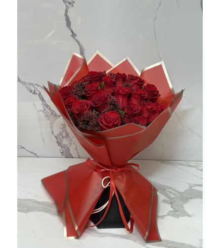 Two Dozen Premium Red Roses - Standard. An arrangement by Grower's Flower Market and Gifts.