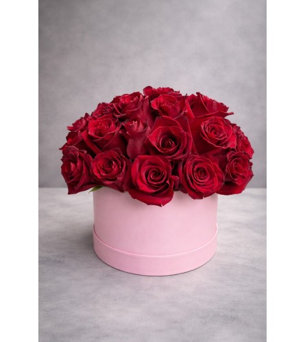 Red roses in box. An arrangement by Grower's Flower Market and Gifts.