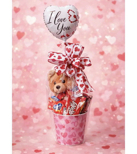 Valentine's Day Candy Basket (With Plush Sitting Bear) - Deluxe. An arrangement by Petals and Co..