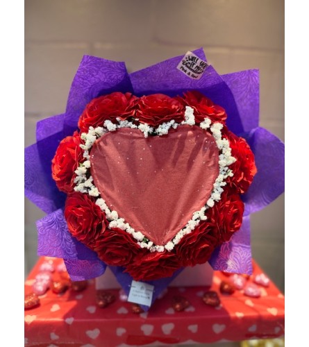 Burn Reveal Bouquet4. An arrangement by Bertha's Florist.