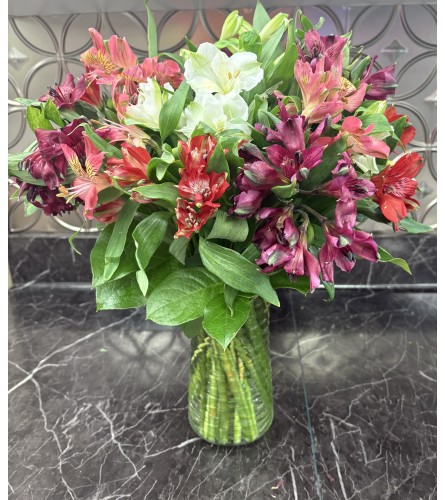 Lily of Incas vase bouquet. An arrangement by Deep Creek Floral.