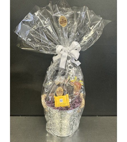 Small Nutty Chocolatier Goodie basket. An arrangement by DMP Flowers and Gifts.