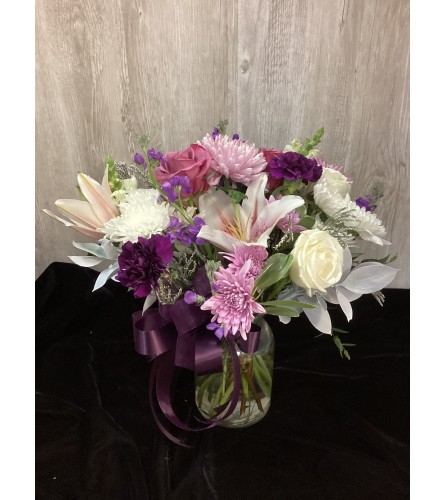 Purple Pretty Passion. An arrangement by Roma Flowers and Gifts.