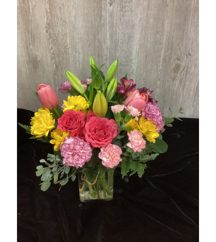Step Into Spring. An arrangement by Roma Flowers and Gifts.