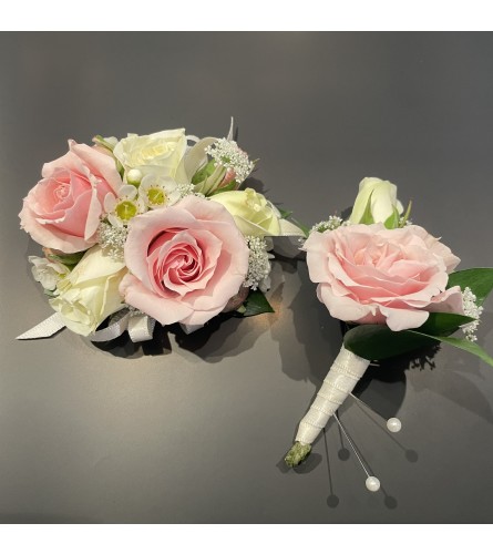 Wrist corsage Duo. An arrangement by Violeta's Flower Shop.