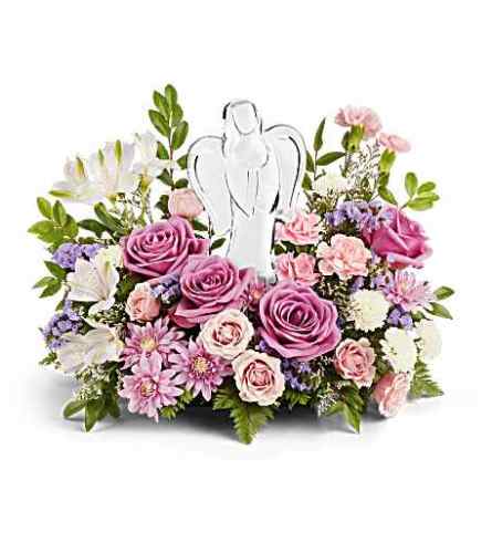 In Heaven's Arms Bouquet - Deluxe. An arrangement by Flowers of Jacksonville.