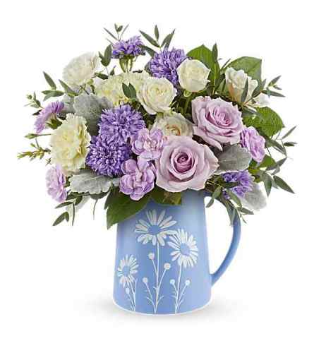 Teleflora's Daisy Haze Bouquet. An arrangement by Love Floral.