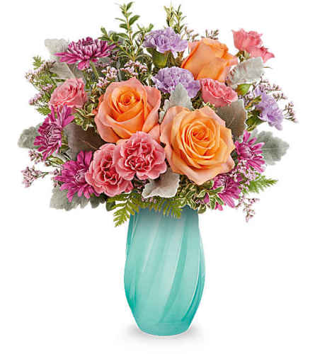 Teleflora's Blue Radiance Bouquet. An arrangement by Love Floral.
