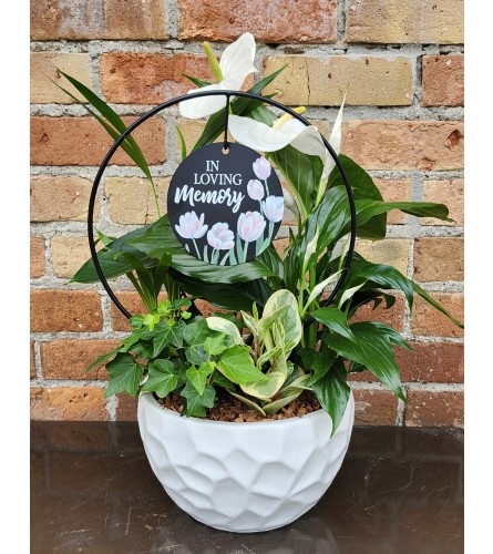 ' By Design' In Loving Memory Planter. An arrangement by Flowers By Design.