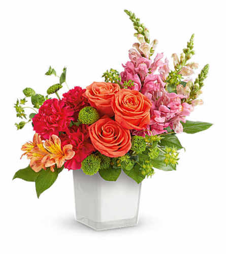 Teleflora's Citrus Sunset Bouquet - Deluxe. An arrangement by Marivel's Florist and Gifts.