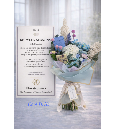 Between Seasons Bouquet - Deluxe. An arrangement by Lori's Hearts and Flowers.