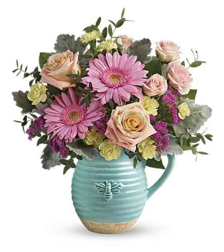 Teleflora's Bee Delighted Bouquet. An arrangement by Love Floral.