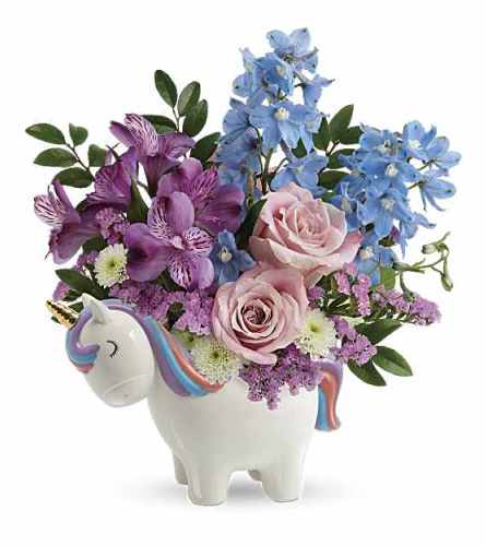 Teleflora's Enchanting Pastels Unicorn. An arrangement by Love Floral.
