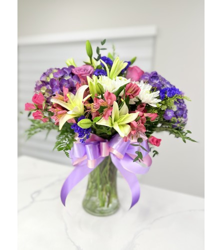 Blush and Lavender Garden Vase | EverBlooming Luxe Designs - Deluxe. An arrangement by EverBlooming Luxe Designs.