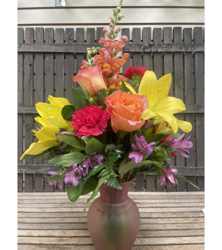 Brighten her Day!. An arrangement by Deep Creek Floral.