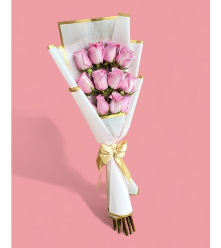 Pink Wrapped Bouquet. An arrangement by Cantutas Florist.