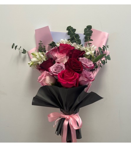 Pink Roses Spectrum. An arrangement by Spring Garden Flowers.