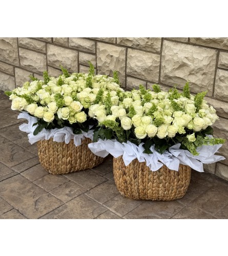 Premium White Rose Basket. An arrangement by Li Flowers.