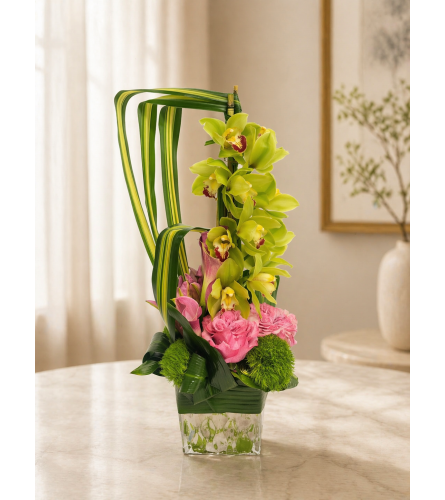Cymbidium Orchids with Roses - Deluxe. An arrangement by Brickell Glamour Flowers.