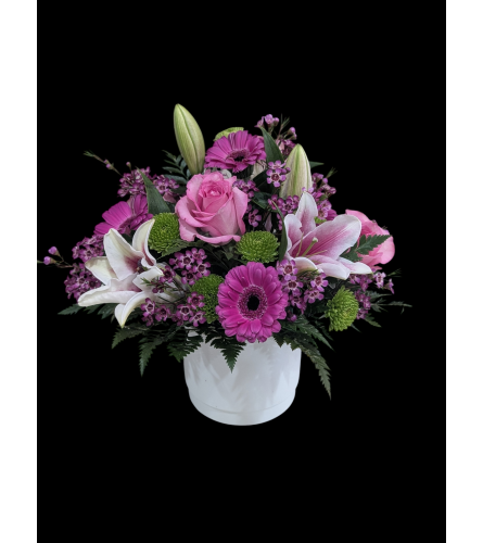 Lilies and Roses Embrace. An arrangement by Flowers by Nancy Joslin.