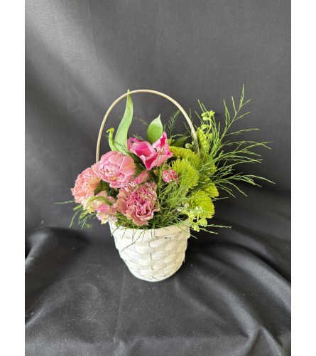 May Day Basket. An arrangement by Evergreen and Lily Floral Studio and Gifts.