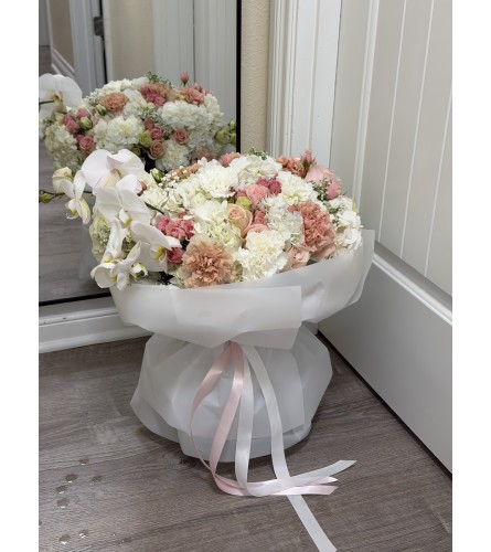 Blush Orchid Garden. An arrangement by Li Flowers.