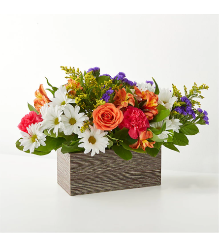 Radiant Joy Blossom. An arrangement by Julie's Artistic Rose.