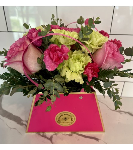 Mothers Day Tote Bouquet. An arrangement by Brookdale Flowers and Gifts.