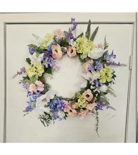 Pastel Dreams Floral Circle. An arrangement by Yesterday's Florist and Gifts.