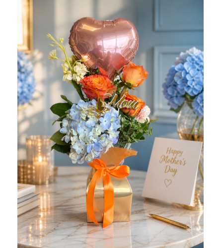 ORANGES MOTHER DAYS. An arrangement by Westchester Flowers and Gifts.