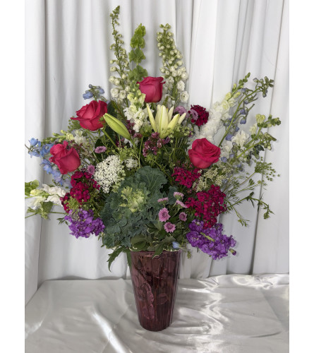 GARDEN PERFECTION. An arrangement by M's Flowers.