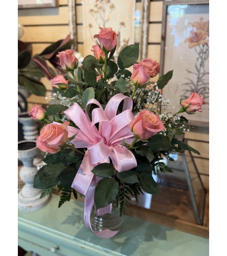 Dozen Light Pink Roses. An arrangement by Busse and Rieck Flowers Plants and Gifts.