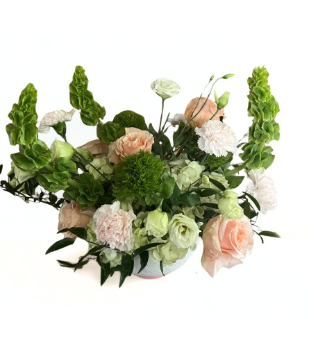 Peach Serenity. An arrangement by Goodman's Florist.