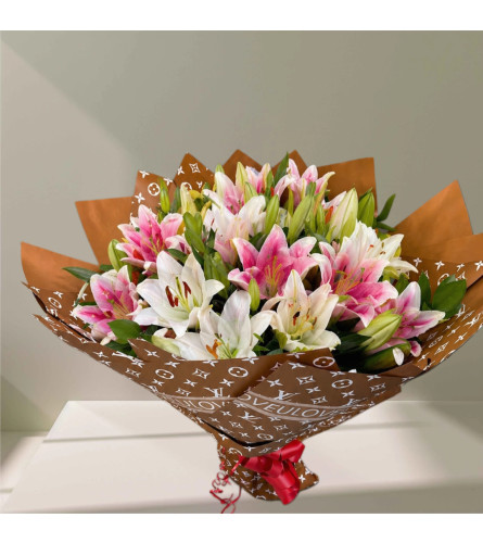 Blushing Lily Luxe Bouquet. An arrangement by Elegant Florist.