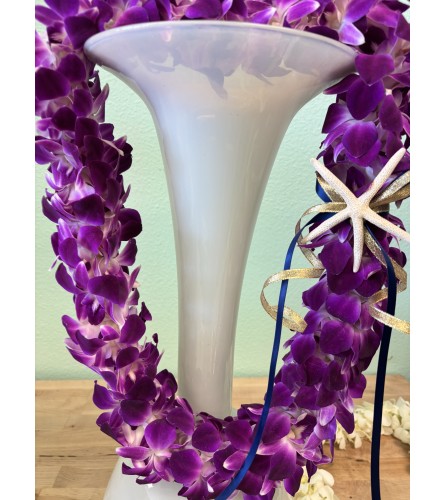 Graduation Lei - Purple Double Orchid. An arrangement by Shell Beach Floral Design.