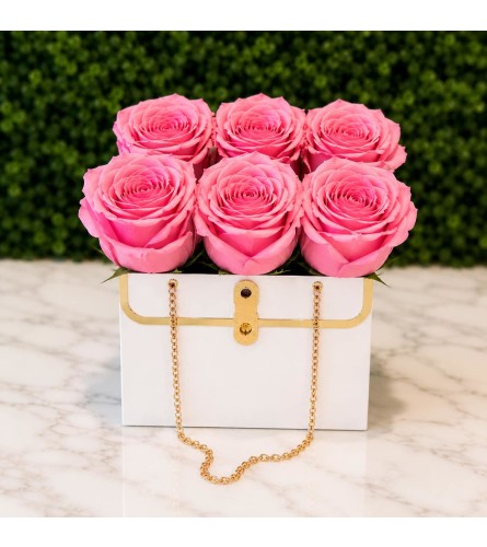 Pink Rose Purse. An arrangement by Cincyfloralnista.