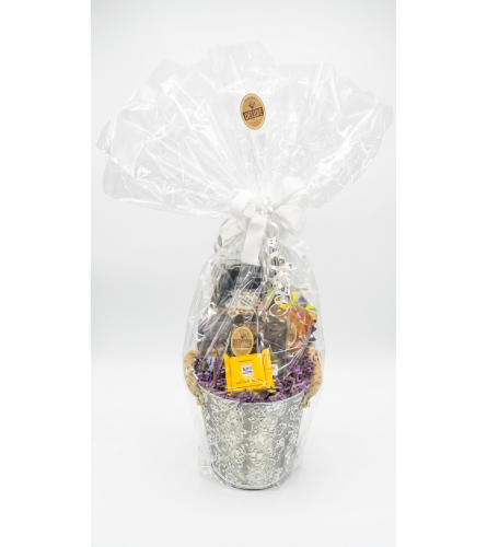 Small Nutty Chocolatier Goodie basket. An arrangement by DMP Flowers and Gifts.