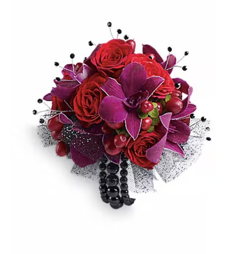 Celebrity Style Corsage. An arrangement by Ada's Flowers.
