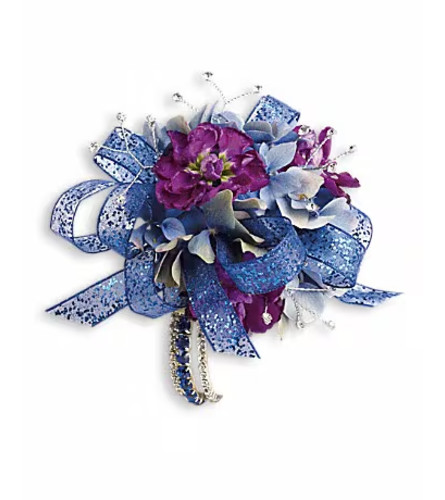 Feel The Beat Corsage. An arrangement by Ada's Flowers.