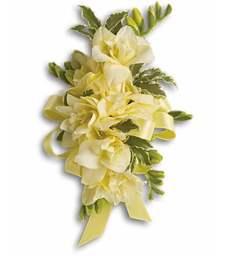 Let Love Shine Corsage. An arrangement by Ada's Flowers.