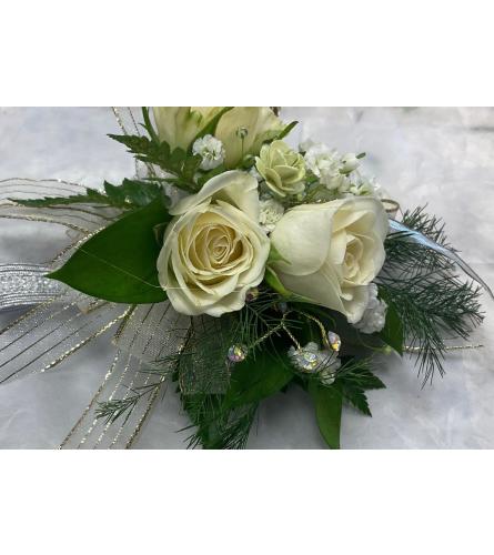 Silver Serenity Corsage. An arrangement by Ada's Flowers.