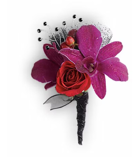 Celebrity Style Boutonniere. An arrangement by Ada's Flowers.